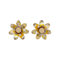 Pair of silver and gold holographic confetti flower studs with gold glitter centres side by side on white