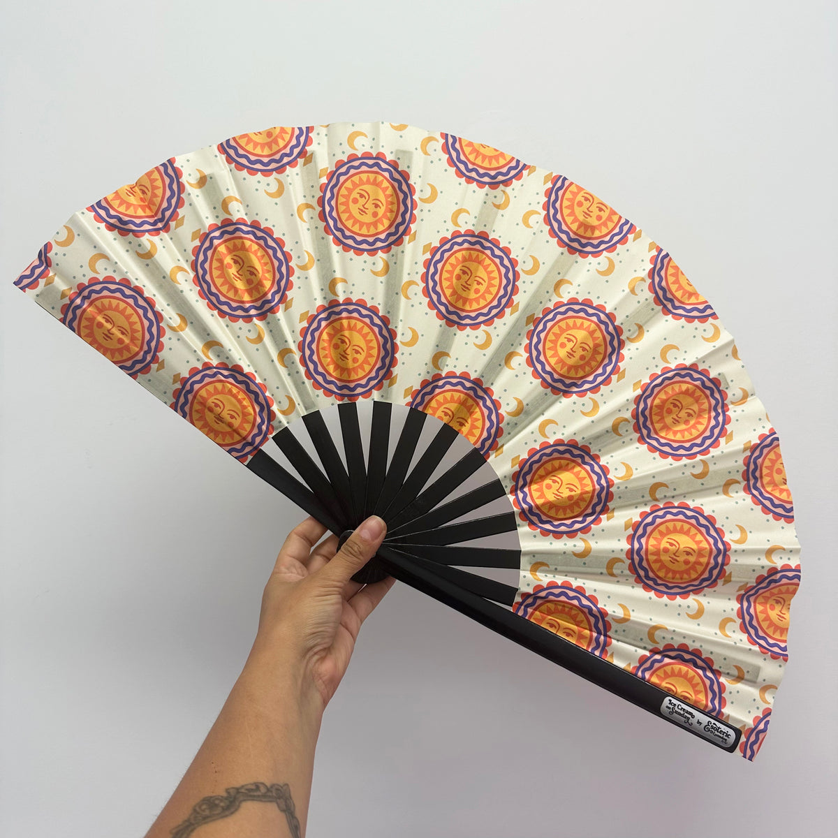 Giant Clacking Hand Fan with Sun Face Tiles print (Glows in UV!)