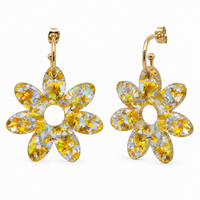 Pair of gold and silver holographic confetti flower hoop earrings with gold hoops, front view on white