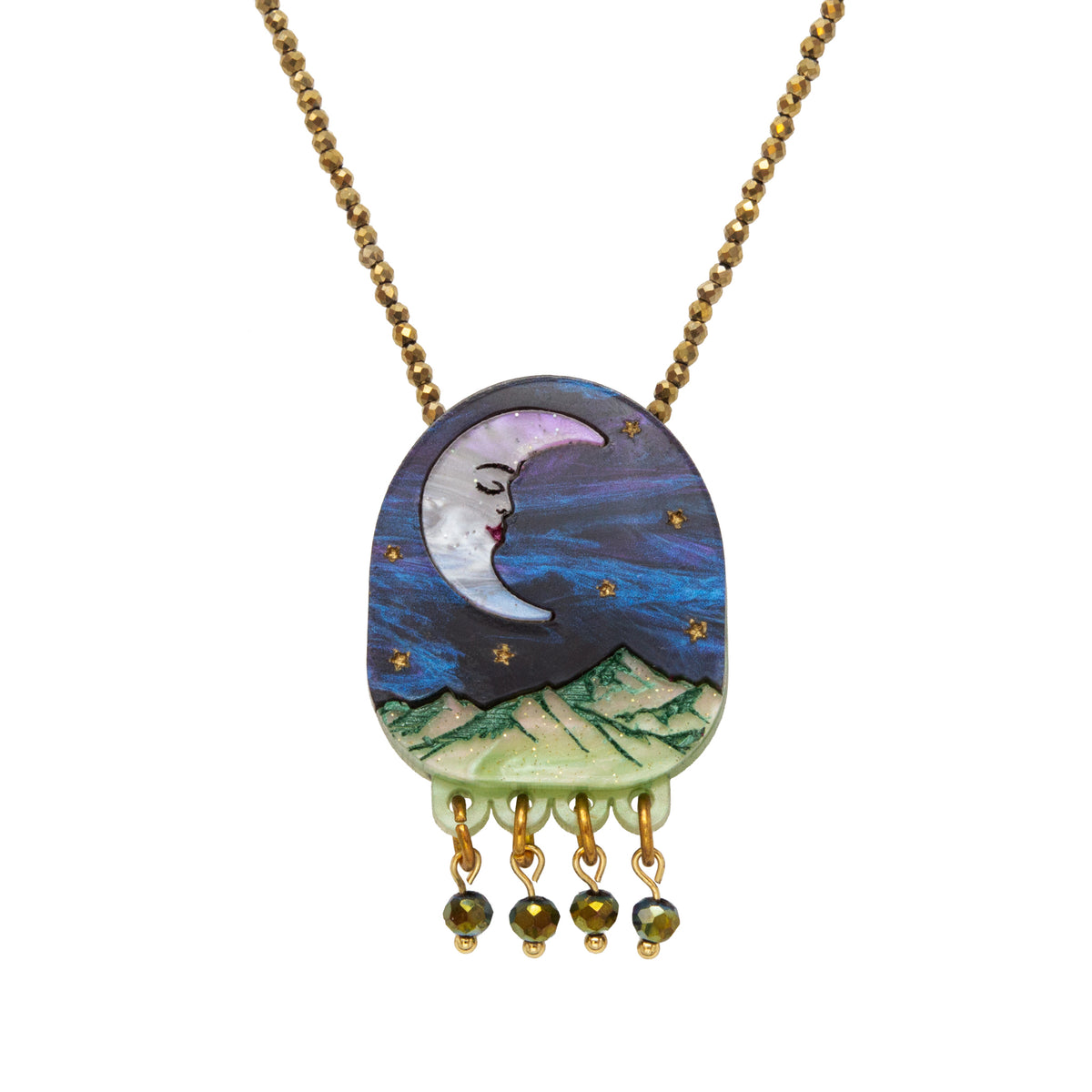 Oval pendant necklace with a sleeping moon, gold stars, green mountains and four green beads, on gold bead chain