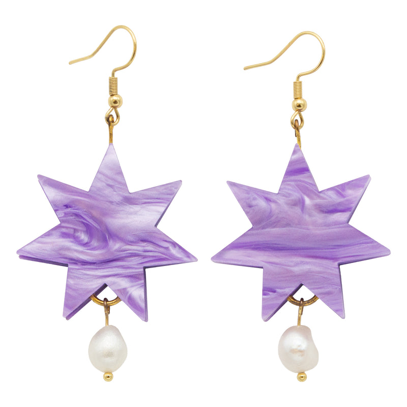 Pair of lilac marbled seven point star earrings with a freshwater pearl drop and gold hooks, on white