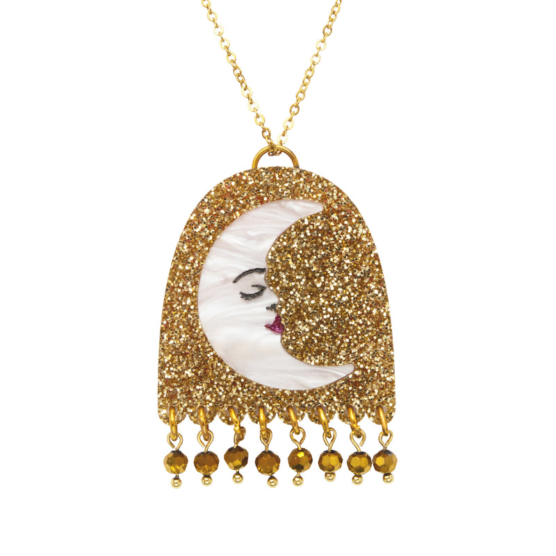 Gold glitter arch pendant with white pearl sleeping moon face and gold bead fringe, on a gold chain
