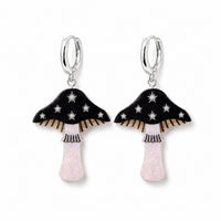 Black toadstool earrings with silver star details, striped gills and pearly pale pink stems on silver huggie hoops