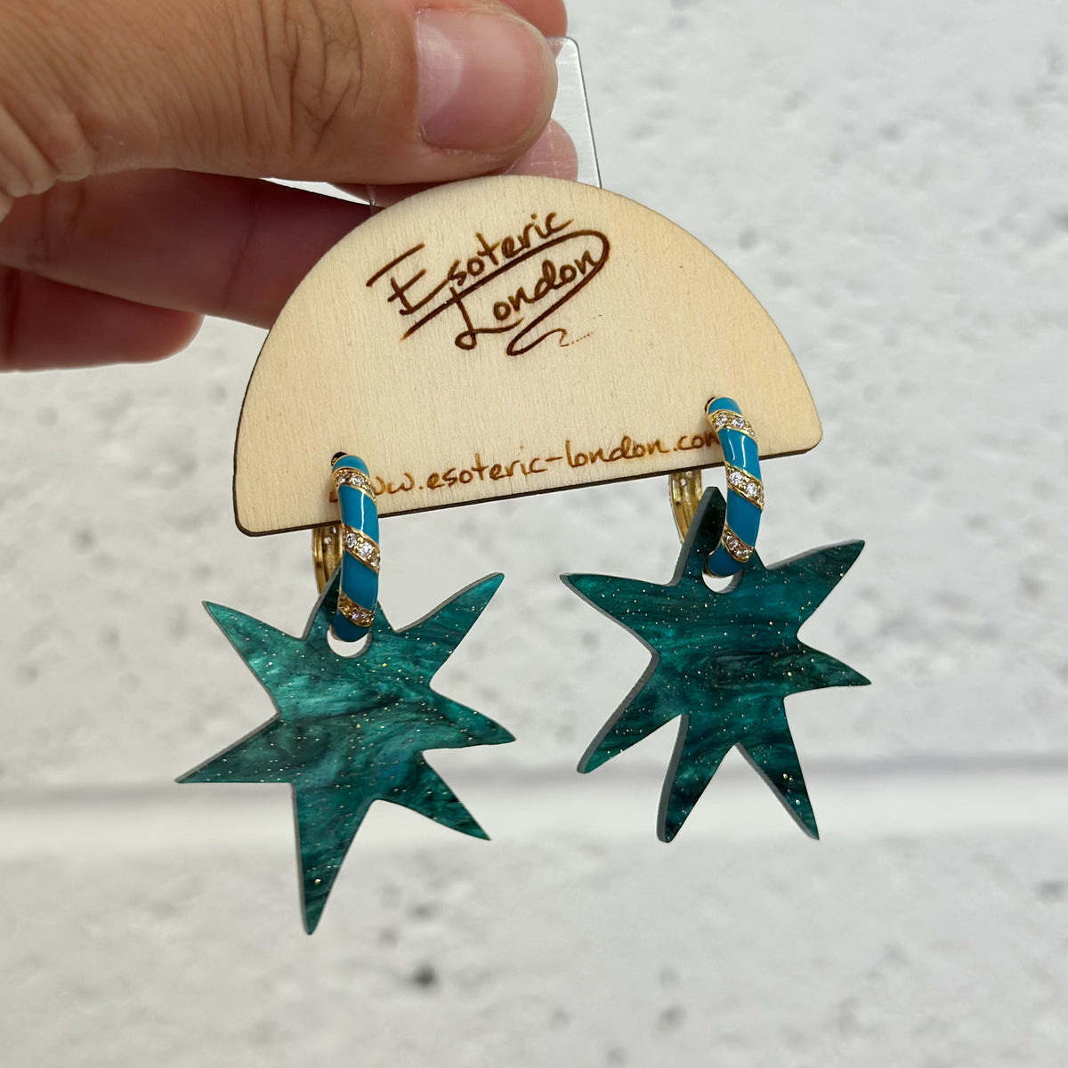 Wonky Star Teal dangle hoop earrings
