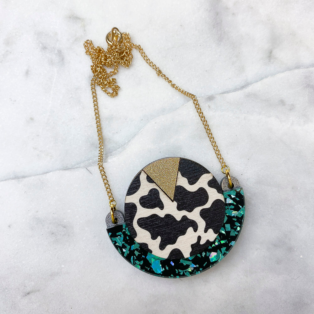 Wild Black & Teal Cow Print Round Pendant Necklace